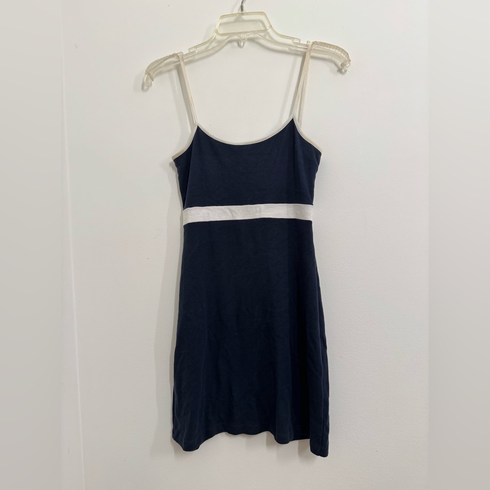 Brandy Melville Lillian dress in navy blue with white accents.